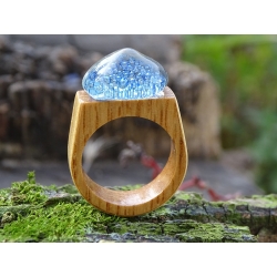 Wooden ring with blue glass